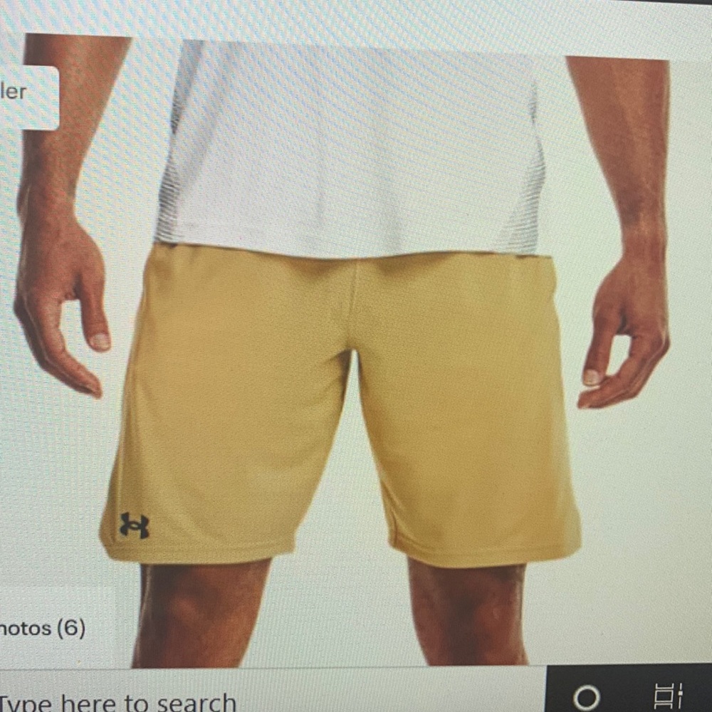 New men’s gold Under Armour shorts